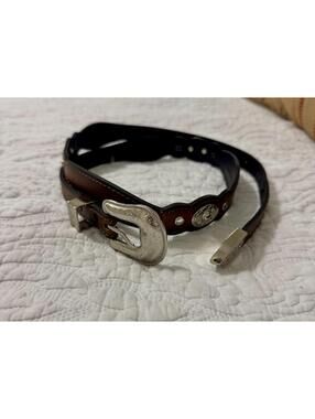 Western  tooled leather hip belt with silver conch details